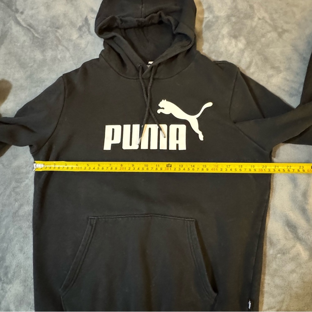 PUMA Black Hoodie with White Logo

#1409 - Picture 2 of 10